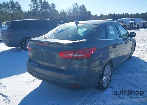 2015 Ford Focus Titanium из США, поврежденный, VIN 1FADP3J21FL353570
